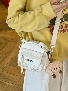 Sac bandoulière blanc oreilles de chat avec poche transparente et peluche sur sweat