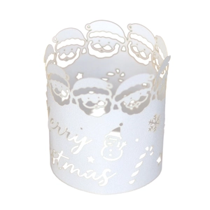 Detailed laser-cut white Christmas paper napkin ring featuring snowflake and Santa Claus