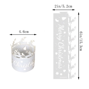White cutout paper Christmas reindeer cupcake wrapper with Merry Christmas lettering