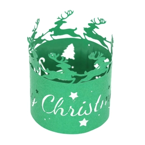 Detailed view of green hollow Christmas paper lanterns featuring reindeer and star patterns