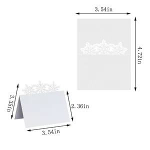 Laser-cut snowflake place cards in pearl white, pack of 50 for holiday table settings