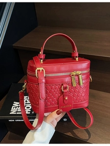 Red PU leather vanity case bucket bag with woven texture and gold zippers for women