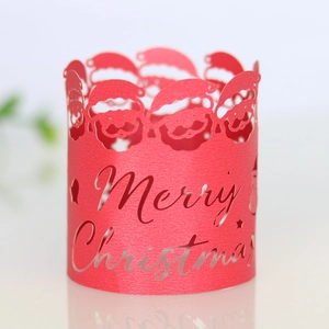 Laser-cut red pearlescent Merry Christmas napkin ring with Santa Claus and star patterns