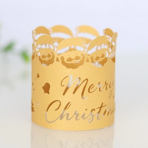 Golden laser-cut paper Christmas cupcake wrapper with Santa Claus and Merry Christmas text