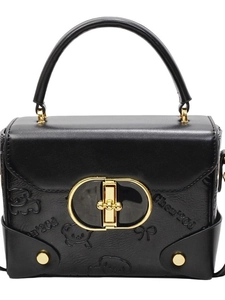 Retro black leather handbag with embossed bear patterns and elegant gold oval lock