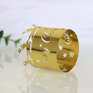 Golden Merry Christmas napkin ring with reindeer and snowflake cutout details