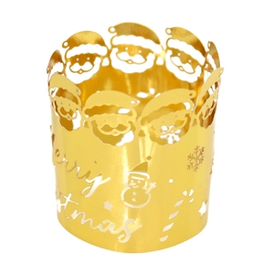 Detailed view of gold cutout Merry Christmas candle shade with Santa and snowflake motifs