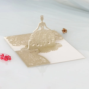 Detailed laser-cut hollow dress pattern on champagne gold glitter 3D pop-up card