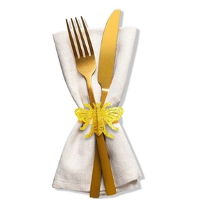 Elegant gold bee napkin ring with hollow-out design and white fabric napkin for wedding banquet