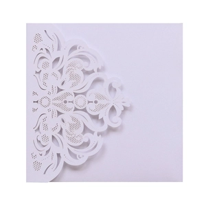 European laser-cut wedding invitation gatefold with white lace floral pattern