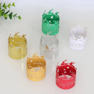 Laser-cut Christmas napkin rings featuring Merry Christmas text and reindeer motifs