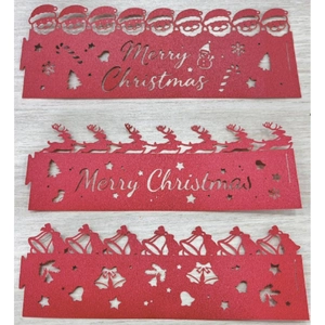 Laser-cut red Christmas paper bands featuring Santa, reindeer and snowflake patterns