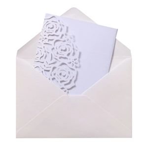 Laser cut rose wedding invitation set with elegant white card and matching envelope