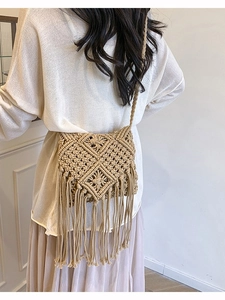 Beige handmade macrame crossbody bag with diamond knit pattern and long tassels