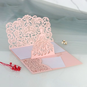 Detailed laser cut 3D pink greeting card with floral lace pattern and girl silhouette