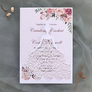 Detail of laser-cut wedding invitation featuring rose dress bride silhouette and floral card