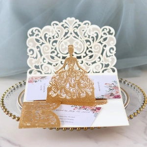 Golden glitter laser cut wedding invitation with 3D bride silhouette and lace pattern