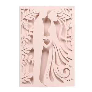 Detailed laser-cut lavender wedding invitation cover with romantic heart and couple motif