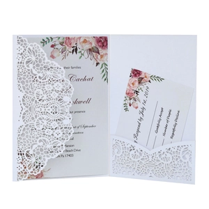 White laser cut wedding invitation set with floral cover and watercolor inner cards