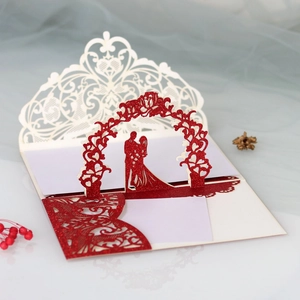 Detailed laser-cut 3D pop-up wedding card with red glitter couple silhouette and lace edges