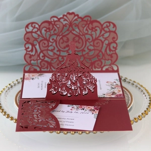 Laser-cut wedding invitation featuring a 3D bridal silhouette and lace vine patterns
