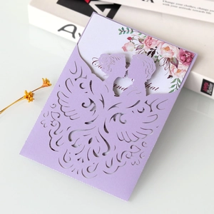 Elegant lavender laser cut wedding invitation with floral inner card and romantic silhouette