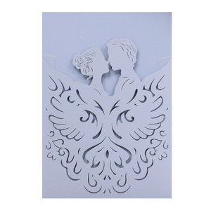 Detailed laser cut purple wedding invitation with romantic kissing couple silhouette