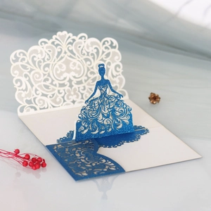 Detailed laser cut 3D princess invitation card with blue glitter and elegant hollow patterns