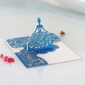 Detailed laser-cut blue glitter 3D pop-up card featuring a ballerina silhouette design