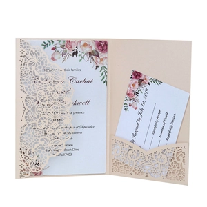 Detailed laser cut floral wedding invitation suite with RSVP card in soft champagne cream