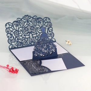 Detailed laser cut floral invitation card with an elegant dress silhouette in navy blue