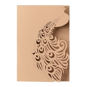 Detailed laser-cut peacock wedding invitation envelope in champagne pearl paper texture