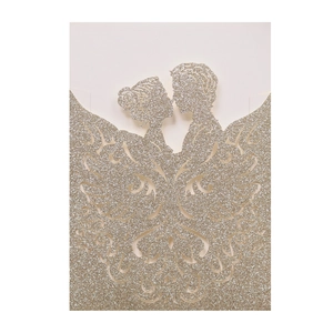 Glittery gold laser cut wedding invitation card featuring a bride and groom silhouette