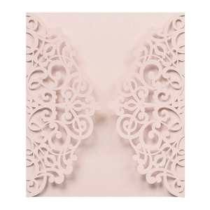 Laser cut laser butterfly invitation cover in pink pearlescent paper with scroll pattern