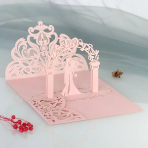 3D laser-cut wedding invitation card with pink romantic silhouettes and floral lace