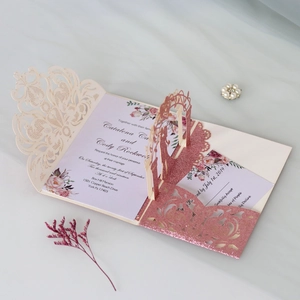 Detailed laser-cut 3D pop-up wedding invitation with glitter rose gold and cream finish