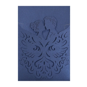 Detailed laser-cut dark blue invitation card with romantic couple and floral pattern