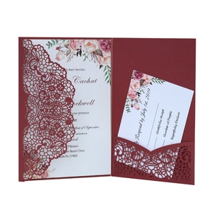 Elegant burgundy laser-cut lace wedding invitation set with floral inner cards