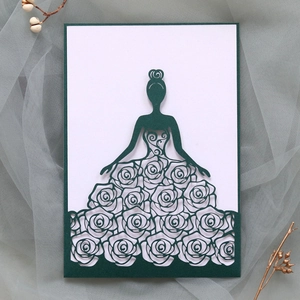 Detail of laser-cut dark green floral girl wedding invitation card with white insert