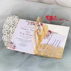 Detailed laser-cut rose hollow wedding invitation with floral inner card and RSVP