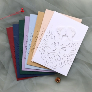 Laser cut wedding invitations showing various colors including red, blue and gold options