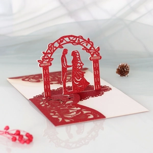 Detail einer roten 3D-Pop-up-Hochzeitskarte mit Braut- und Bräutigam-Silhouette