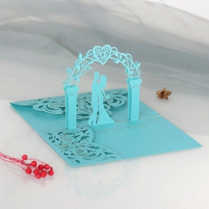 Detailed laser-cut 3D wedding invitation card featuring romantic couple silhouette