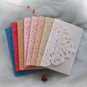 Laser cut glitter wedding invitations in blue red gold and silver floral designs