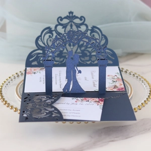 Detailed laser cut lace wedding invitation with 3D gate design on elegant pearl paper