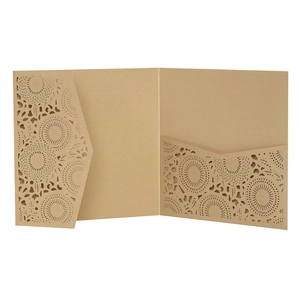 Detail of laser-cut sunflower pattern on brown kraft paper wedding invitation card