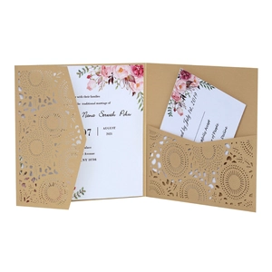 Rustic laser cut wedding invitation set with floral card and kraft pocket sleeve
