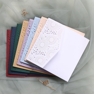 Detailed laser-cut sunflower pattern on assorted colorful wedding invitations cards