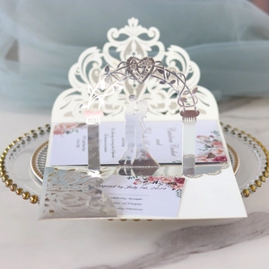 Detailed laser-cut wedding card with 3D silver mirror arch and intricate lace design
