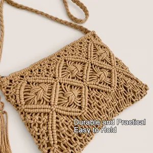 Detailed macro view of handmade macrame bag with woven mesh patterns and fringe tassels